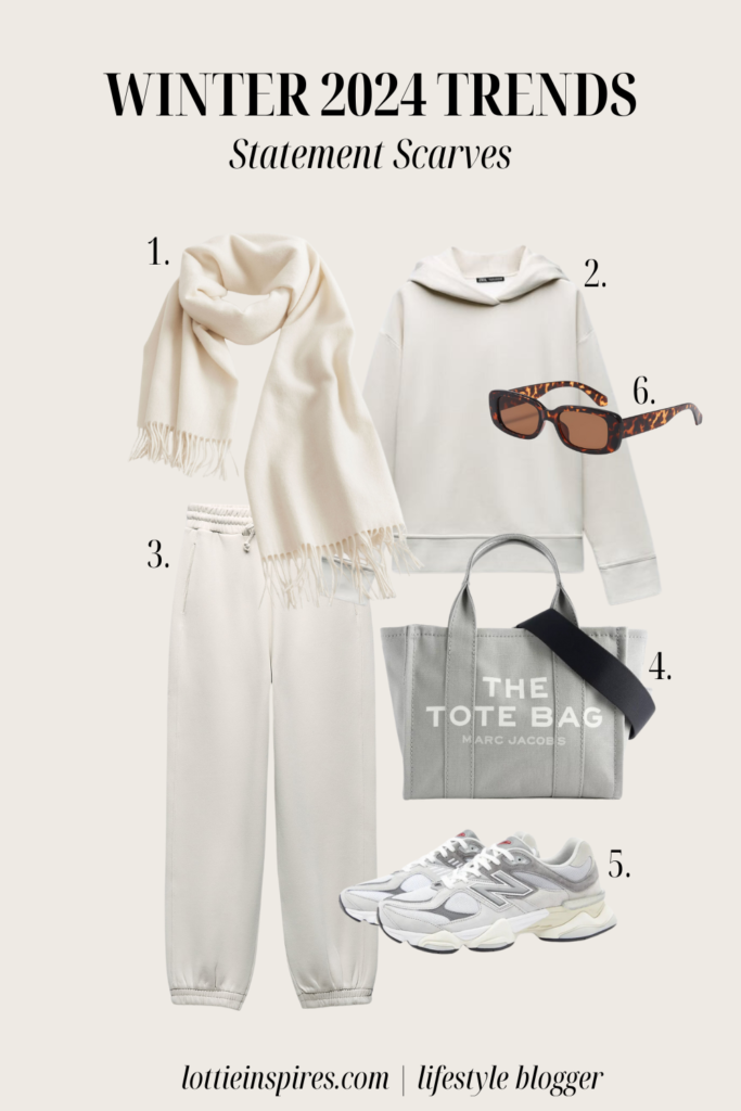 Winter outfit including large, cream scarf, white tracksuit, Mark Jacobs tote bag, grey new balance trainers and brown tortoise shell sunglasses.